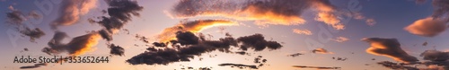 Photos Sunset dramatic sky background and colorful dark clouds.