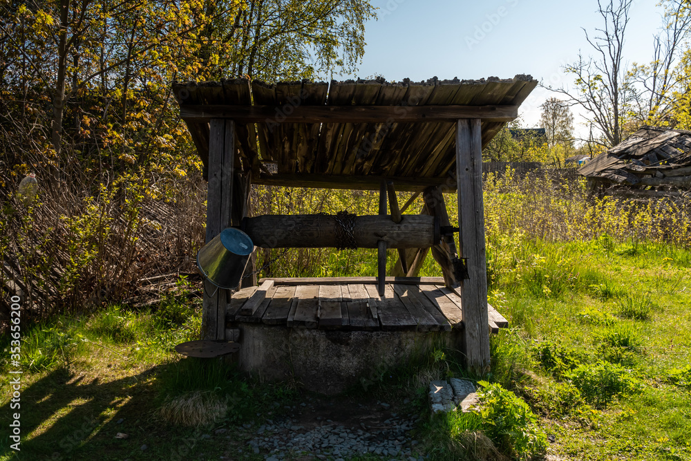 A picturesque old wooden water well in the city of Novaya Ladoga. A picturesque old wooden water well in the city of Novaya Ladoga.