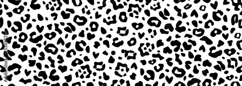 Seamless pattern of snow leopard skin pattern with little hearts. Minimal black artistic spots isolated on white background. Abstract wild fabric print. Digital motif wallpaper. Cheetah modern poster