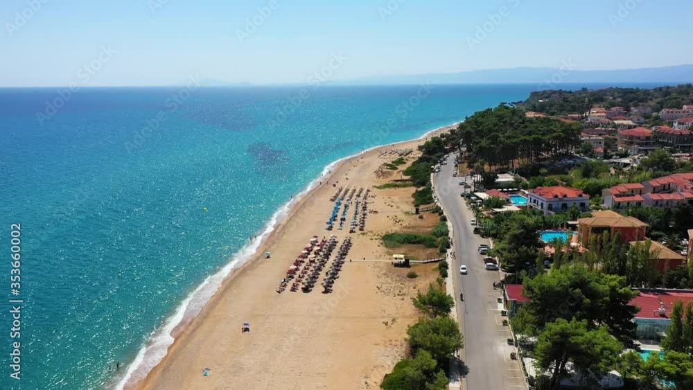 Skala, one of the top beach locations on the Greek island of Kefalonia. Spectacular view over beach of Skala. Skala beach with soft sand and turquoise water in Kefalonia, Greece. Skala, one of the top beach locations on the Greek island of Kefalonia. Spectacular view over beach of Skala. Skala beach with soft sand and turquoise water in Kefalonia, Greece.