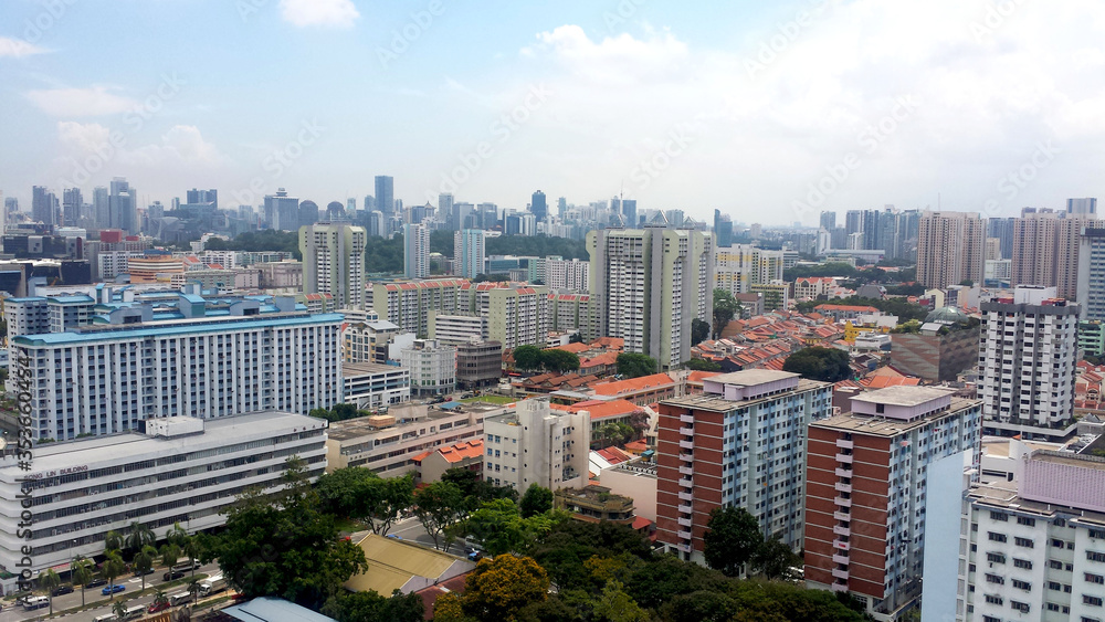 Obraz premium aerial view of big building including condominium and HDB of city in singapore,selective focus, selective focus on subject, background blur