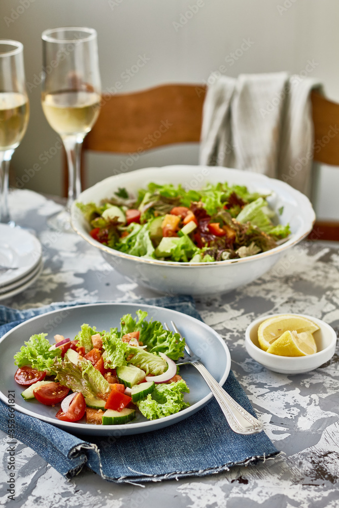 Healthy vegetable salad of fresh tomato, cucumber, pepper, onion, lettuce and olive oil on plate. Diet menu
Healthy vegetable salad of fresh tomato, cucumber, pepper, onion, lettuce and olive oil on plate. Diet menu