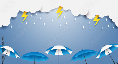 Rainy season. design with raining drops, umbrella and clouds on blue background. vector.