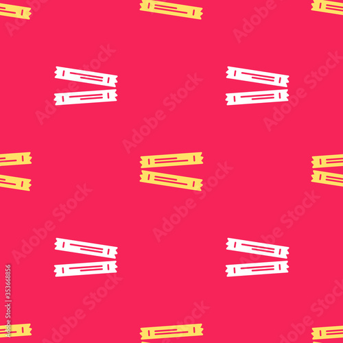 Yellow Sugar stick packets icon isolated seamless pattern on red background. Blank individual package for bulk food products as coffee, salt, spices. Vector.