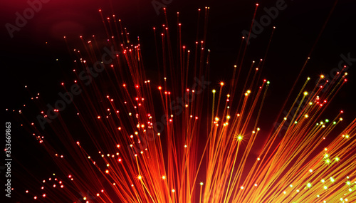 Optical fiber network cable on black background.