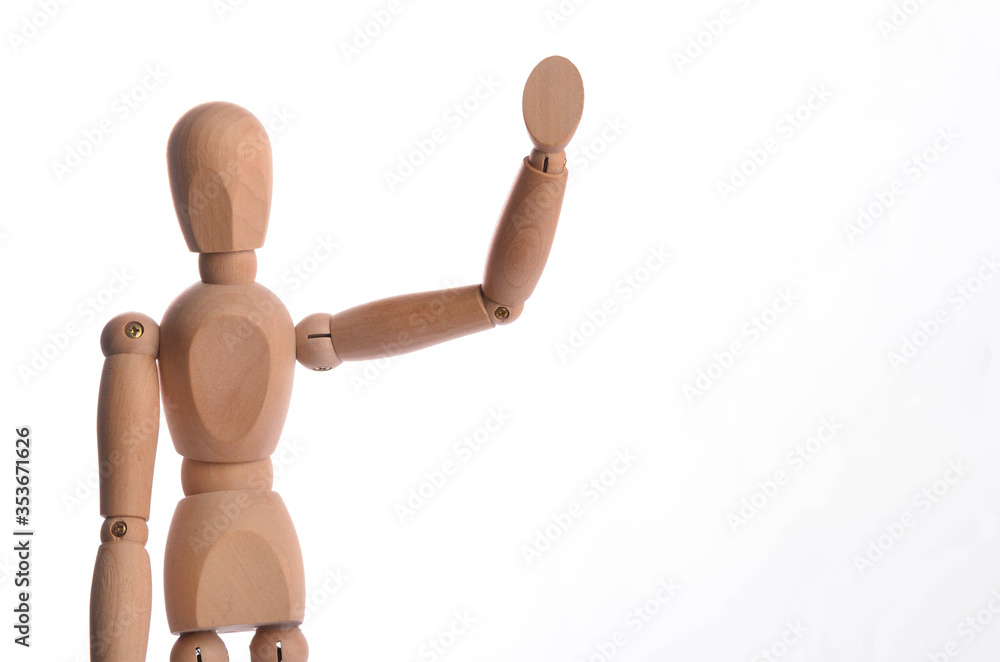 Wooden figure mannequin posing in action isolated on white background. Wooden figure mannequin posing in action isolated on white background.