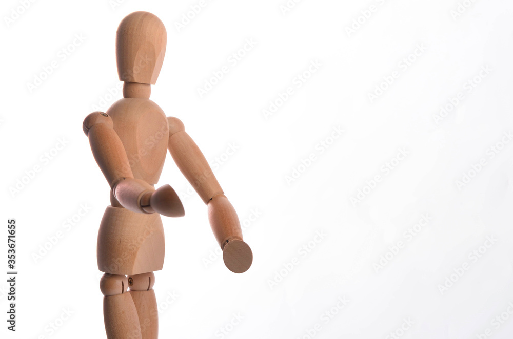 Wooden figure mannequin posing in action isolated on white background. Wooden figure mannequin posing in action isolated on white background.