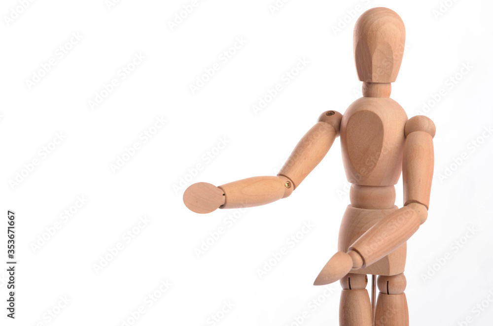 Wooden figure mannequin posing in action isolated on white background. Wooden figure mannequin posing in action isolated on white background.