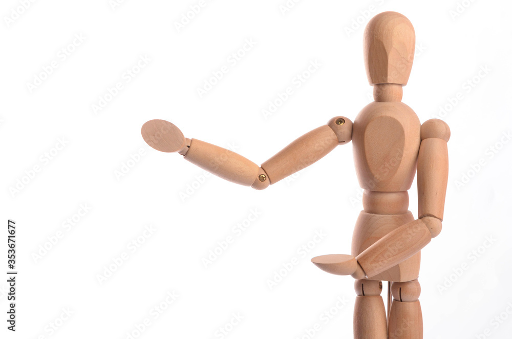 Wooden figure mannequin posing in action isolated on white background. Wooden figure mannequin posing in action isolated on white background.