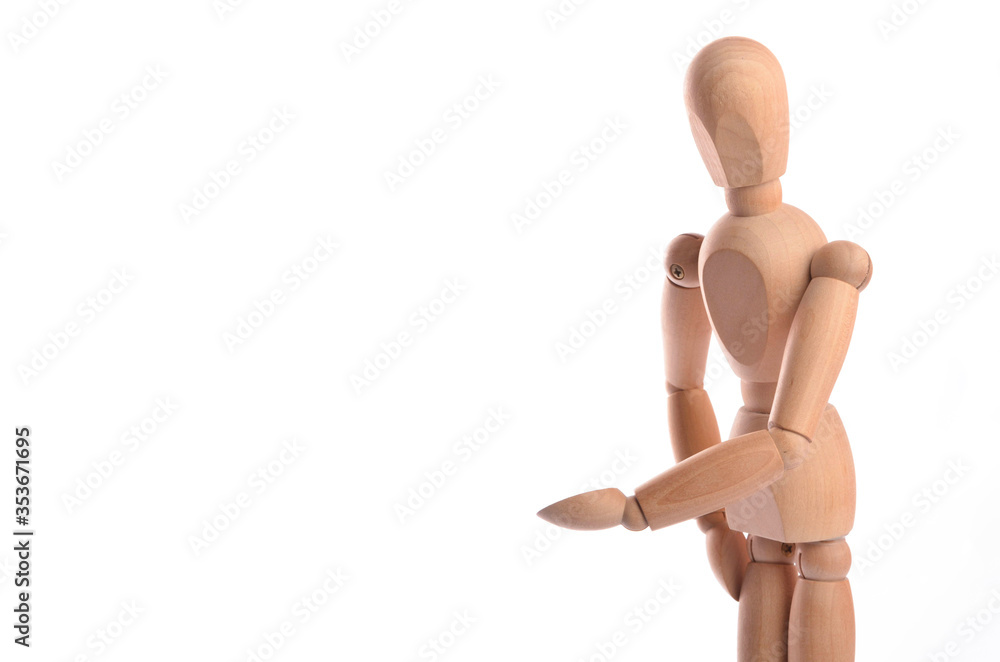 Wooden figure mannequin posing in action isolated on white background. Wooden figure mannequin posing in action isolated on white background.