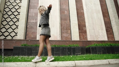 Young woman walking in the park