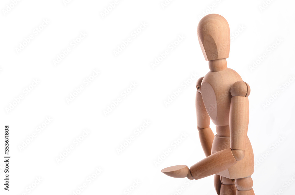 Wooden figure mannequin posing in action isolated on white background. Wooden figure mannequin posing in action isolated on white background.
