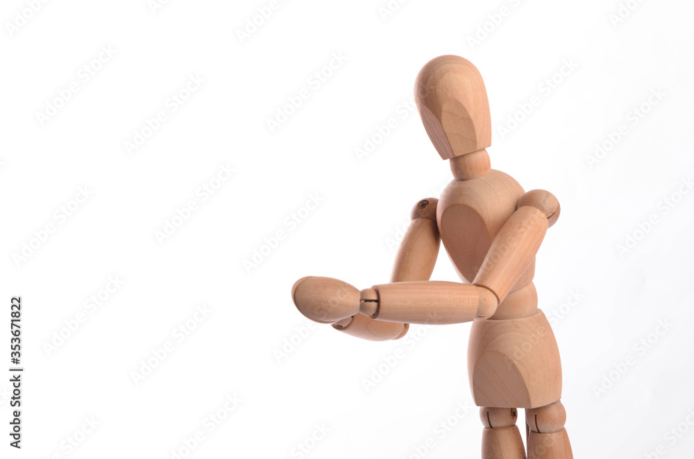 Wooden figure mannequin posing in action isolated on white background. Wooden figure mannequin posing in action isolated on white background.
