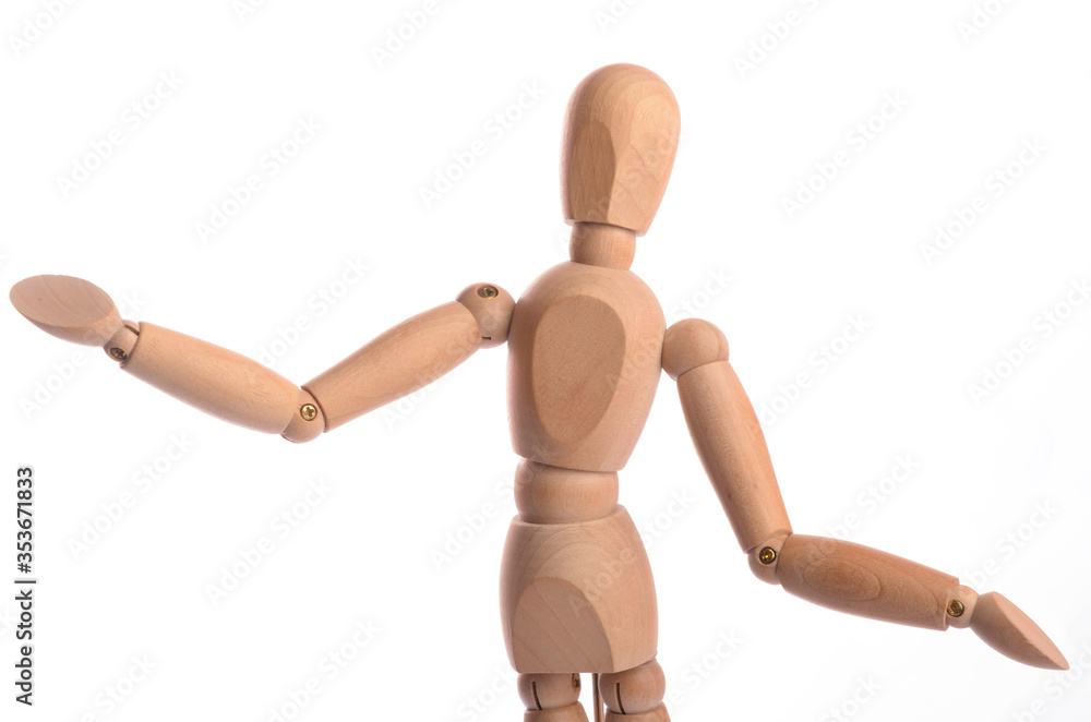 Wooden figure mannequin posing in action isolated on white background. Wooden figure mannequin posing in action isolated on white background.