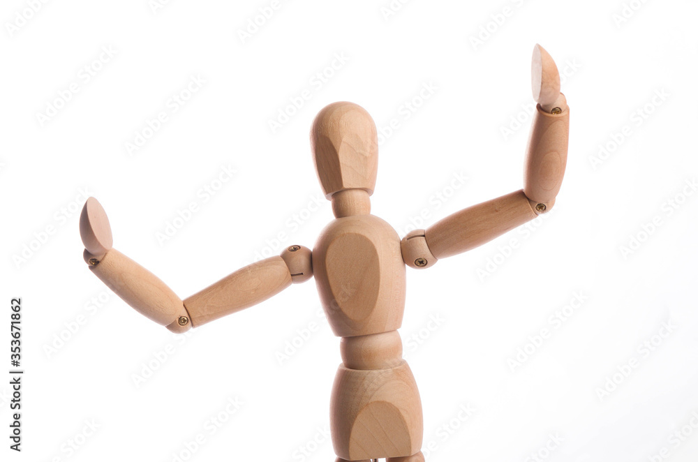Wooden figure mannequin posing in action isolated on white background. Wooden figure mannequin posing in action isolated on white background.
