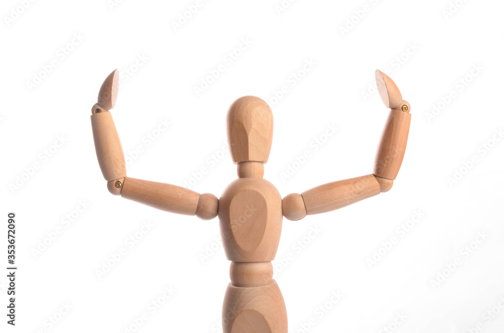 Wooden figure mannequin posing in action isolated on white background. Wooden figure mannequin posing in action isolated on white background.