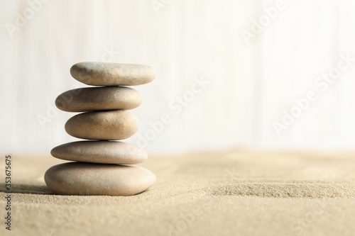 Stones on the sand background. Zen concept