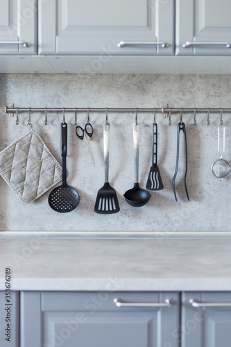 Kitchen tools on gray kitchen