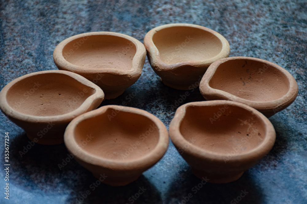 Picture of handmade beautiful traditional clay oil lamp which is used during diwali festival Picture of handmade beautiful traditional clay oil lamp which is used during diwali festival