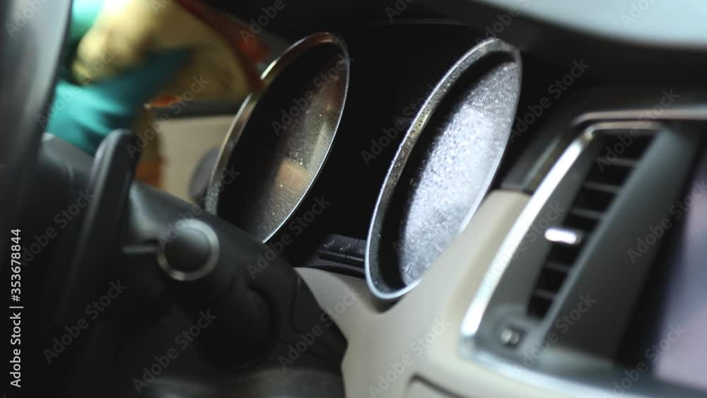 Wipe the steering wheel, the dials and instruments of the car with a special dry rag close-up. Cleaning the speedometer and tachometer Wipe the steering wheel, the dials and instruments of the car with a special dry rag close-up. Cleaning the speedometer and tachometer