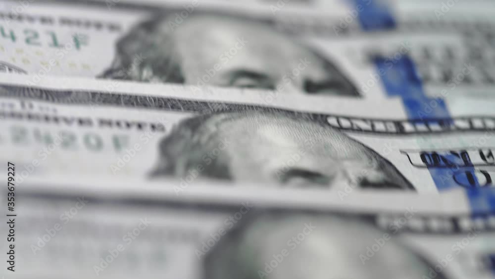 Macro lots of 100 american dollar bills. Cash money banknotes. Finance and investment concept. Closeup shot. Currency exchange of one hundred usd. Rich business economy of usa. Franklin's face texture Macro lots of 100 american dollar bills. Cash money banknotes. Finance and investment concept. Closeup shot. Currency exchange of one hundred usd. Rich business economy of usa. Franklin's face texture