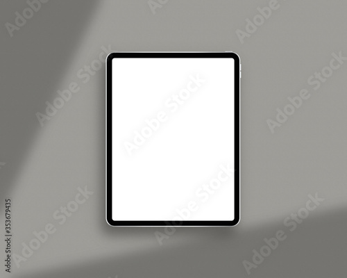 Modern tablet with blank white screen. Mockup template with shadow overlay. Photo mockup with clipping path.