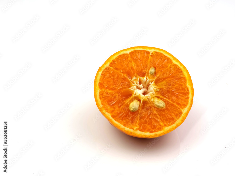 Fototapeta premium Oranges, sliced fruit on a white background High in vitamin C and anti-oxidants