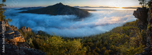 Mountain landscape. South Urals at sunset. The view from the top. Russia. photo