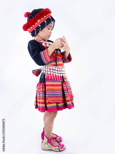 Hmong children little girls wearing traditional dress Taking pictures with film camera on white background