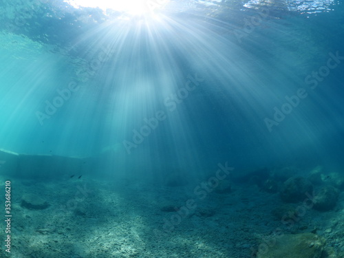 sun beams sun rays sun shine underwater nice light ocean scenery reflections