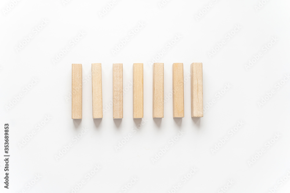 wooden bars lie on a light background wooden bars lie on a light background