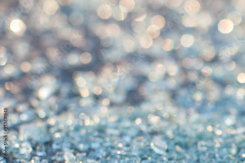 cullet, background of glass granules, bokeh and glitter