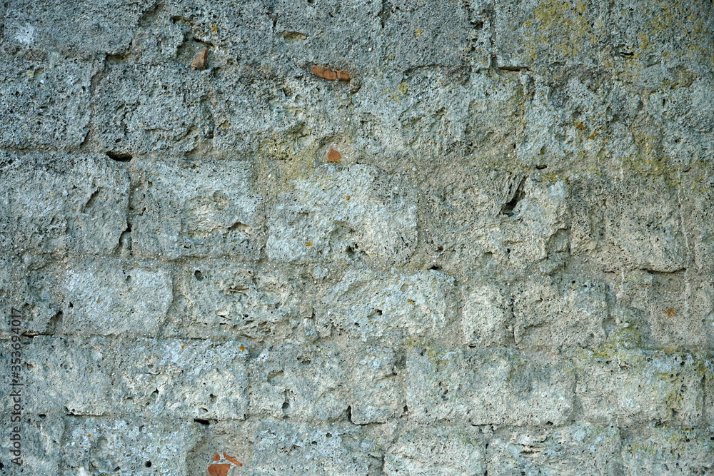Fototapeta premium Artfully built wall with natural stone