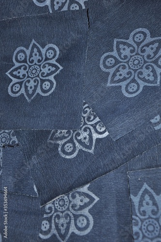 blue denim jeans with floral pattern