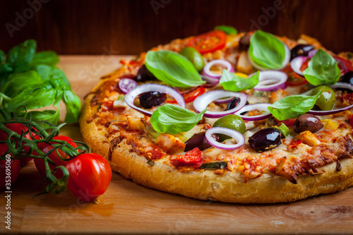 Italian cheese pizza with black olives and onions