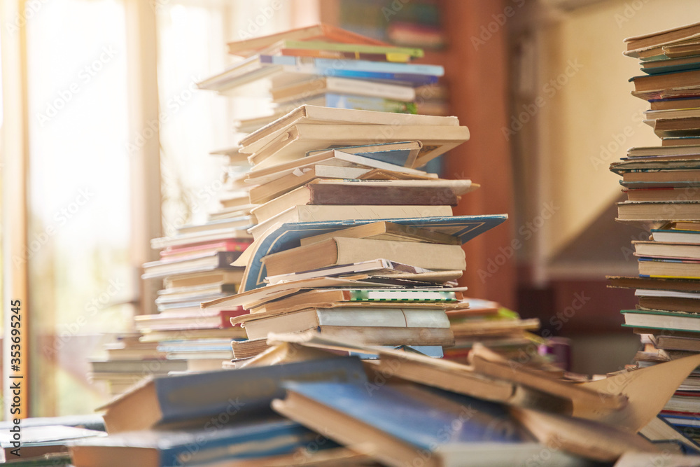 Pile of old books on the table. Lots of old books. Copy space Pile of old books on the table. Lots of old books. Copy space