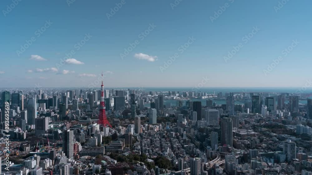 Tokyo city skyline aerial view. Minato District and Tokyo Bay during a nice sunny day. 4K time-lapse Tokyo city skyline aerial view. Minato District and Tokyo Bay during a nice sunny day. 4K time-lapse