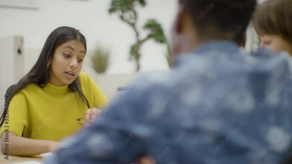 Two colleagues working together in modern office space Two colleagues working together in modern office space