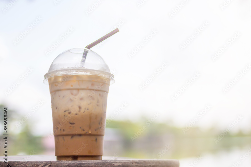 Smooth Focus and soft Focus,The iced coffee cups that were placed on the tables in the office were served from the coffee shops that are not far apart to serve customers. Coffee shop service concept Smooth Focus and soft Focus,The iced coffee cups that were placed on the tables in the office were served from the coffee shops that are not far apart to serve customers. Coffee shop service concept