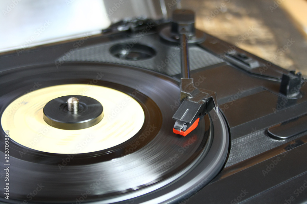 Black record player with vinyl record Black record player with vinyl record