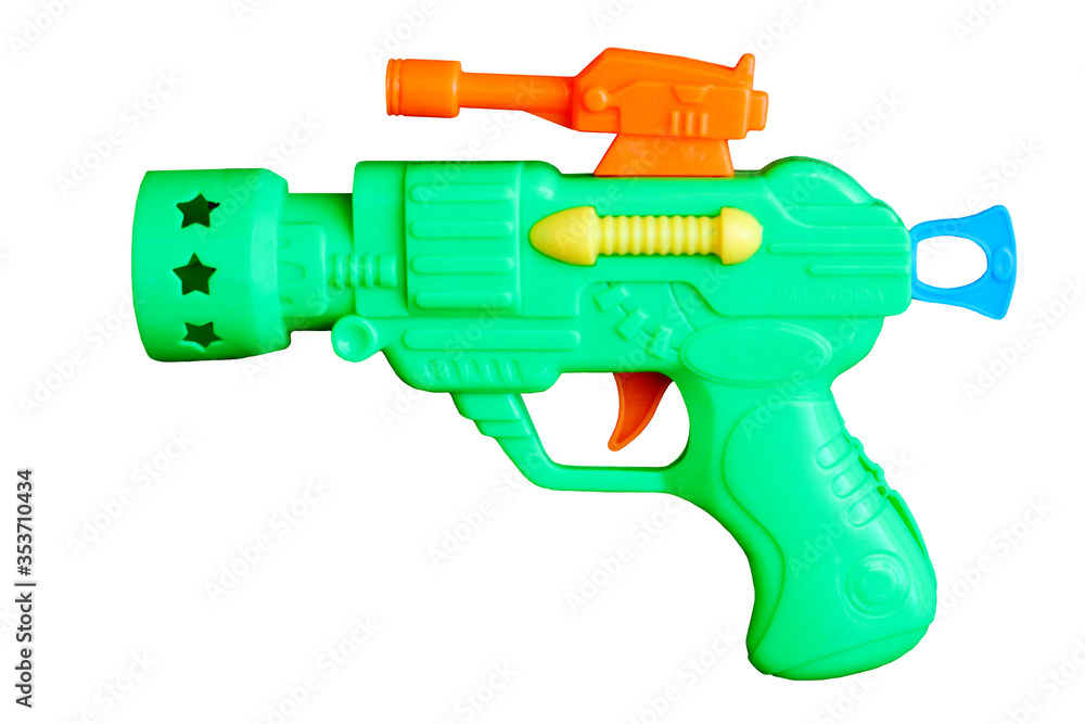 Green plastic pistol toy isolated on a white background Green plastic pistol toy isolated on a white background