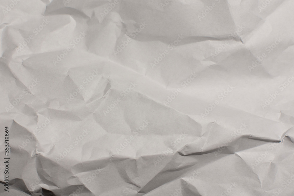 Crumpled sheet of paper. A sheet of white paper. Crumpled sheet of paper. A sheet of white paper.