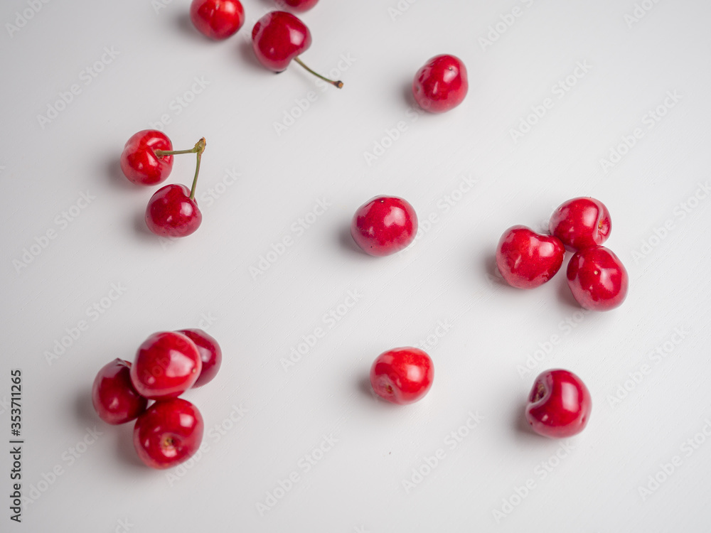 Sweet red cherries on white Sweet red cherries on white