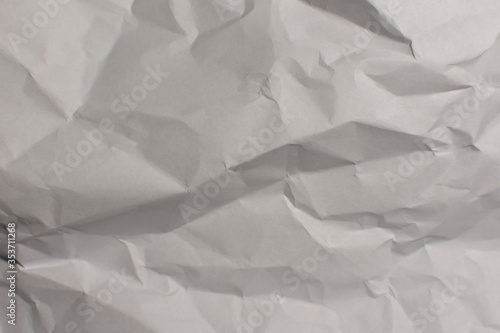 Crumpled sheet of paper. A sheet of white paper.