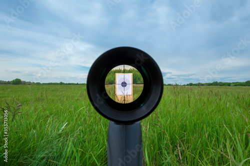 Sniper gun scope view, target 