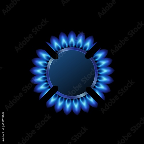 Top view modern gas burner with blue flame, black steel grate.