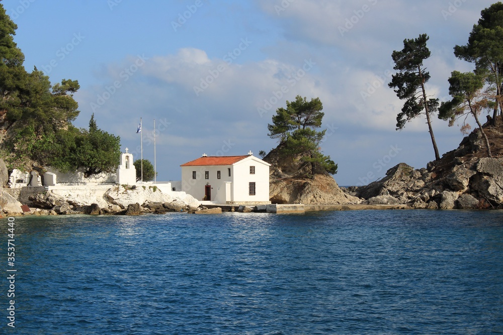 The islet of Panagia and Panagia orthodox chapel in Parga town in regional unit of Preveza in Epirus, Greece. Parga lies on the Ionian coast in Mediterranean sea