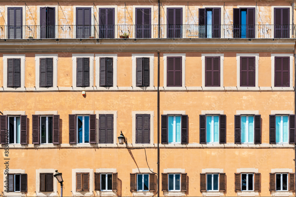 Buiding wall with windows  in Campo de' Fiori in Rome, Italy.