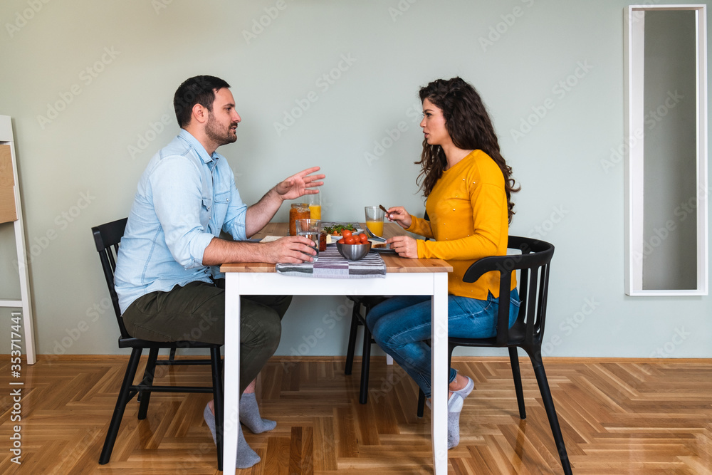 Couple talking and having breakfast stock photo