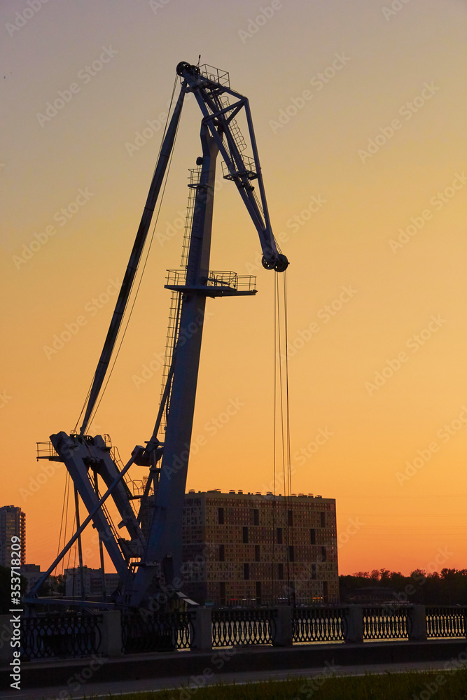 Industrial construction cranes the construction of an building Industrial construction cranes the construction of an building